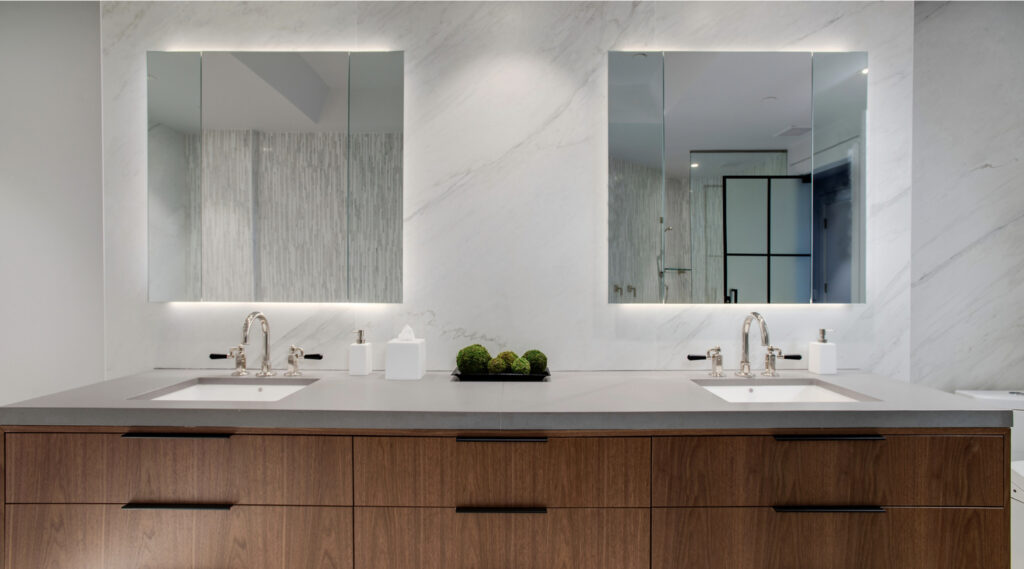 Double vanity with two backlit custom mirrors